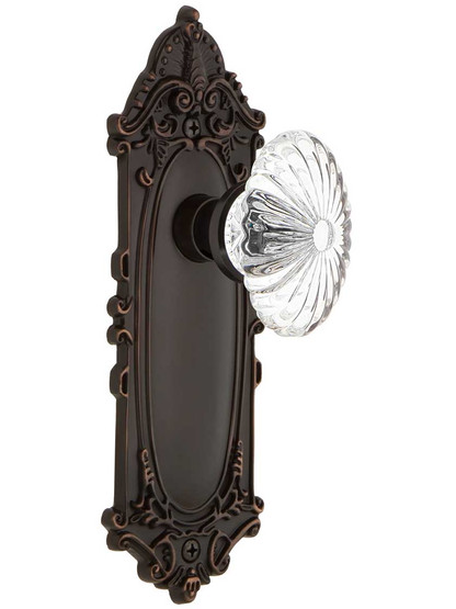 Largo Design Door Set with Oval Fluted Crystal Glass Knobs in Timeless Bronze.